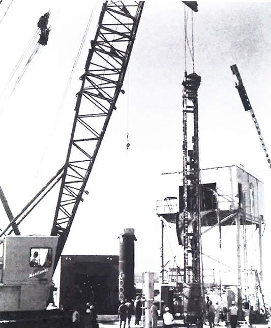 An archival photo shows transportation of a rack in preparation for the Auk nuclear event at the Nevada Test Site in 1964. Gamma and neutron detectors were placed on such racks.